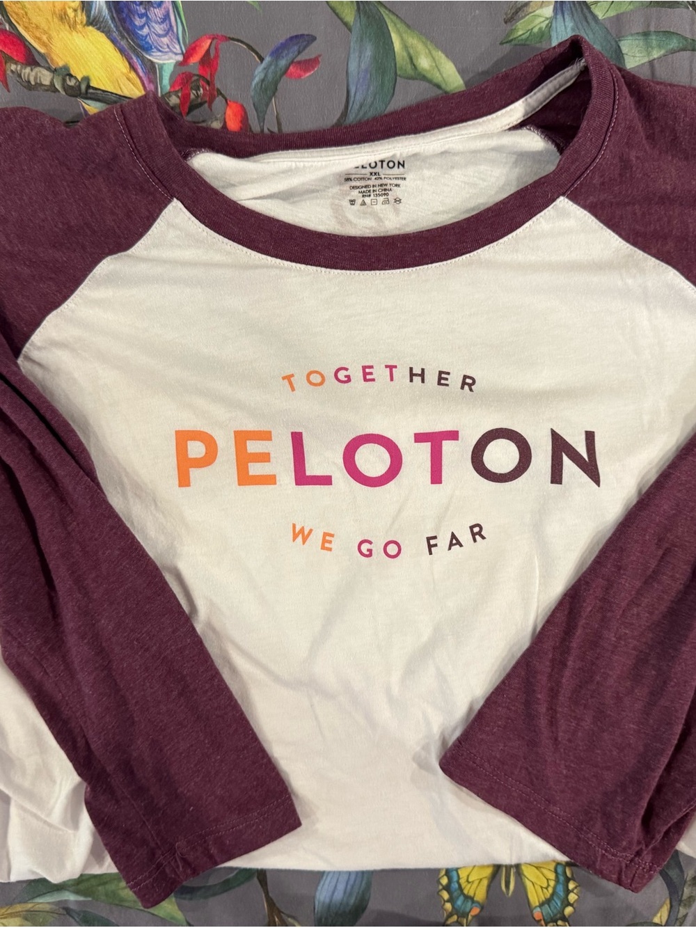 Peloton White Tee with Plum Trim and Multicolor Logo